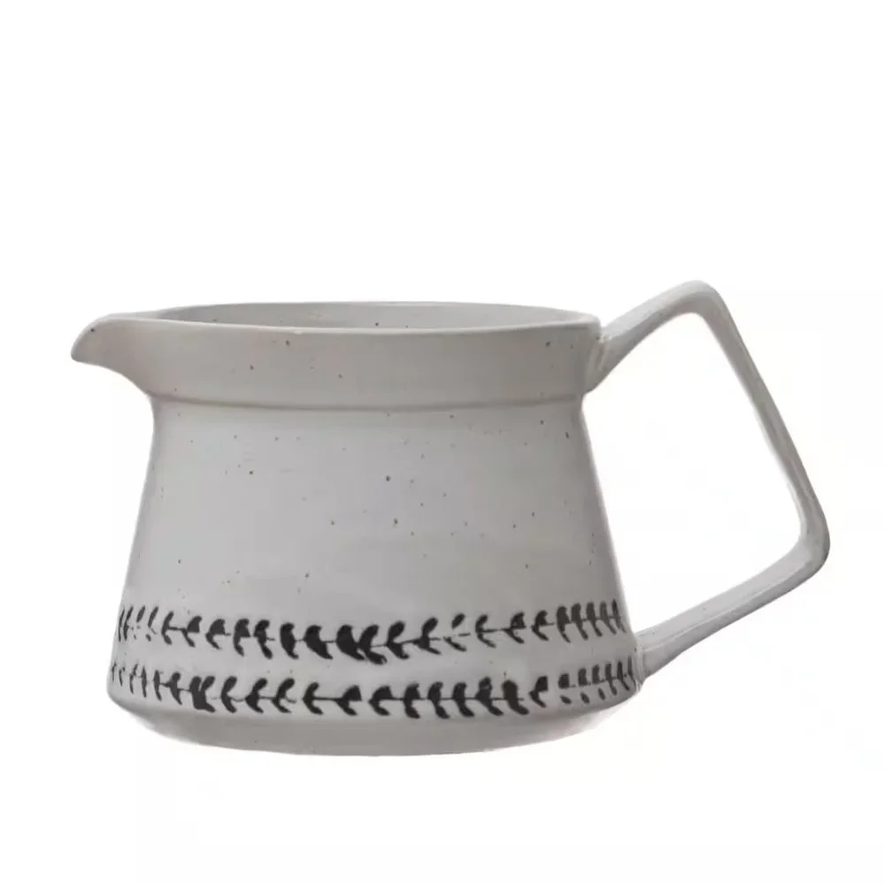 Creative Co-Op White & Black Debossed Pattern Reactive Glaze Stoneware Creamer